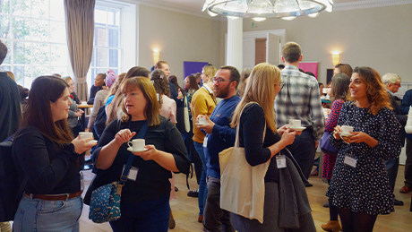 A group of networking attendees of the Digital Families 2022 conference. 